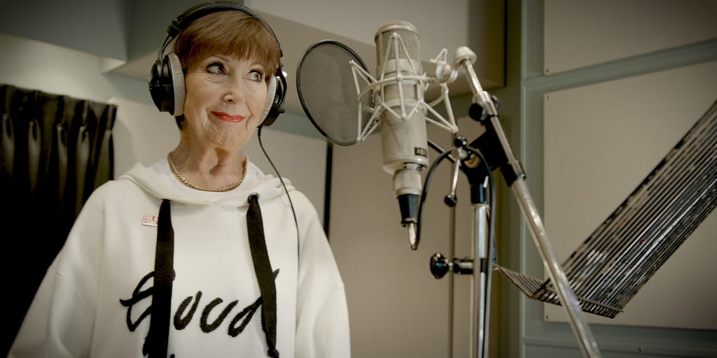 Discover Anita Harris's heartfelt tribute song 'Never Lose Hope,' honoring her late husband and supporting Alzheimer's Research UK